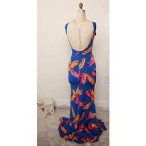 SOLD! Long low back blue dress w feather print